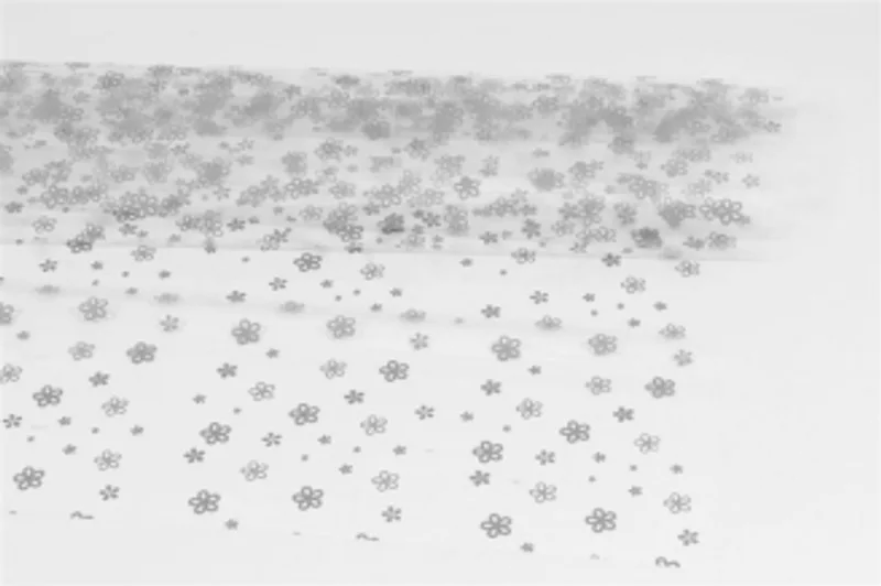 Hauptproduktbild Celofánové archy s potiskem 25my 70x100 cm - lila kvítečka [25 ks]
