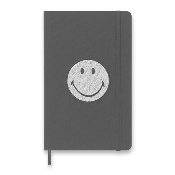 Hauptproduktbild Zápisník Moleskine 2023 SMILEY, tvrdé desky L, linkovaný, černý